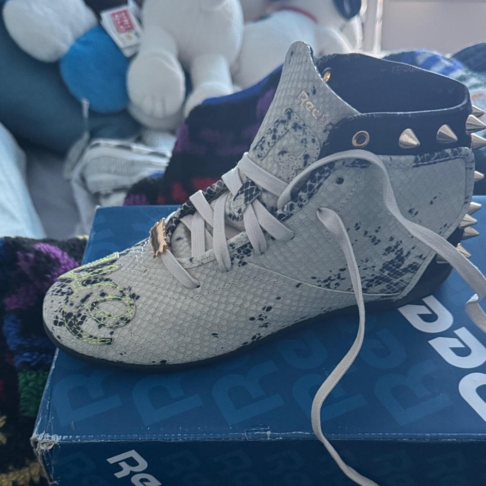 Melody Ehsani x Reebok White and Black Spiked Sneakers